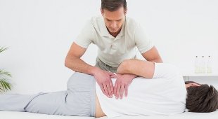 back pain in the lumbar region massage
